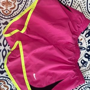 Pink Nike running shorts
